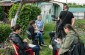 Yahad team records witness interview in his garden © Aleksey Kasyanov/Yahad-In Unum